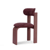 Modern dining chair in matte painted wood and plush velvet fabric