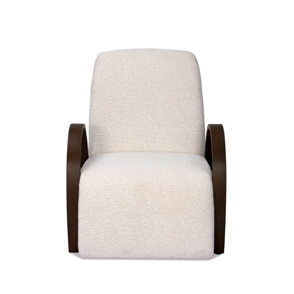 Contemporary armchair with textured white upholstery and curved wood armrests.
