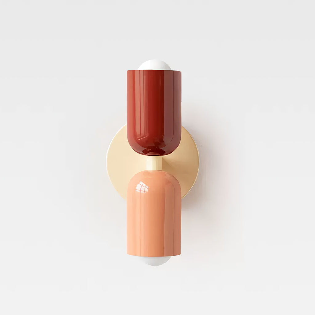 Playful and chic wall lamp in maroon red and pink steel