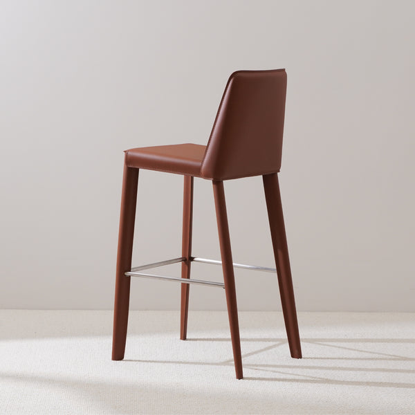 Brown saddle leather bar stool with stainless steel footrest sleek back support