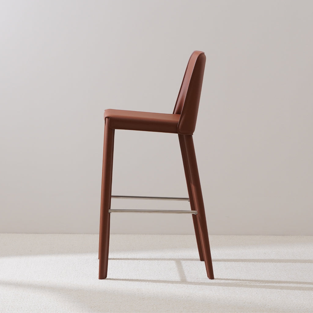 Brown saddle leather bar stool with stainless steel footrest slim design