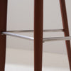 Brown saddle leather bar stool with sleek and contemporary stainless steel footrest