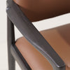 Close-up of solid wood in black on Brody Dining Chair's Arms