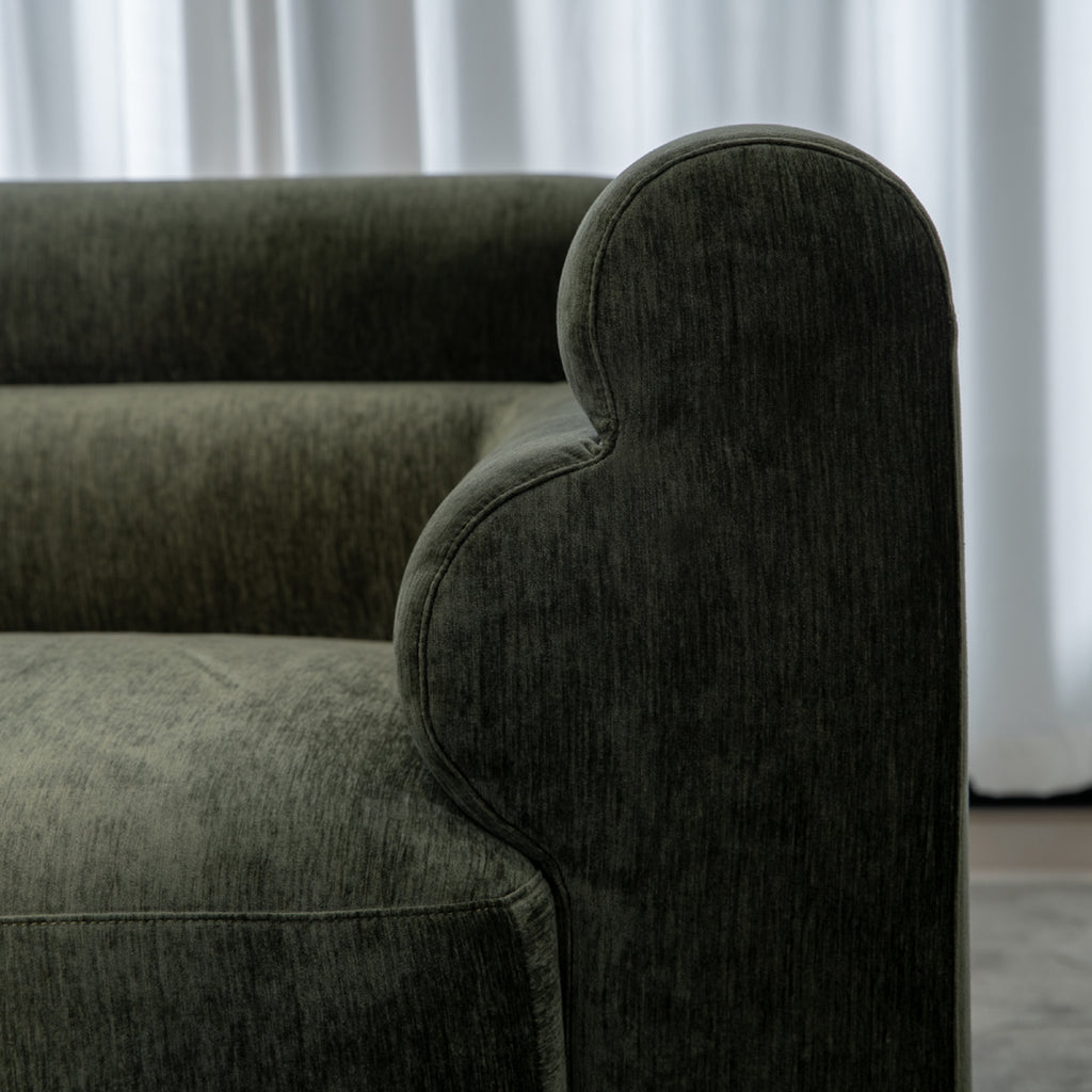Sculptural lounge chair with trapezoidal curves detail