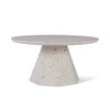 White microcement finish round pedestal coffee tables for modern living spaces