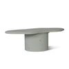 Irregular and circular coffee table design in sky blue micro-cement texture.