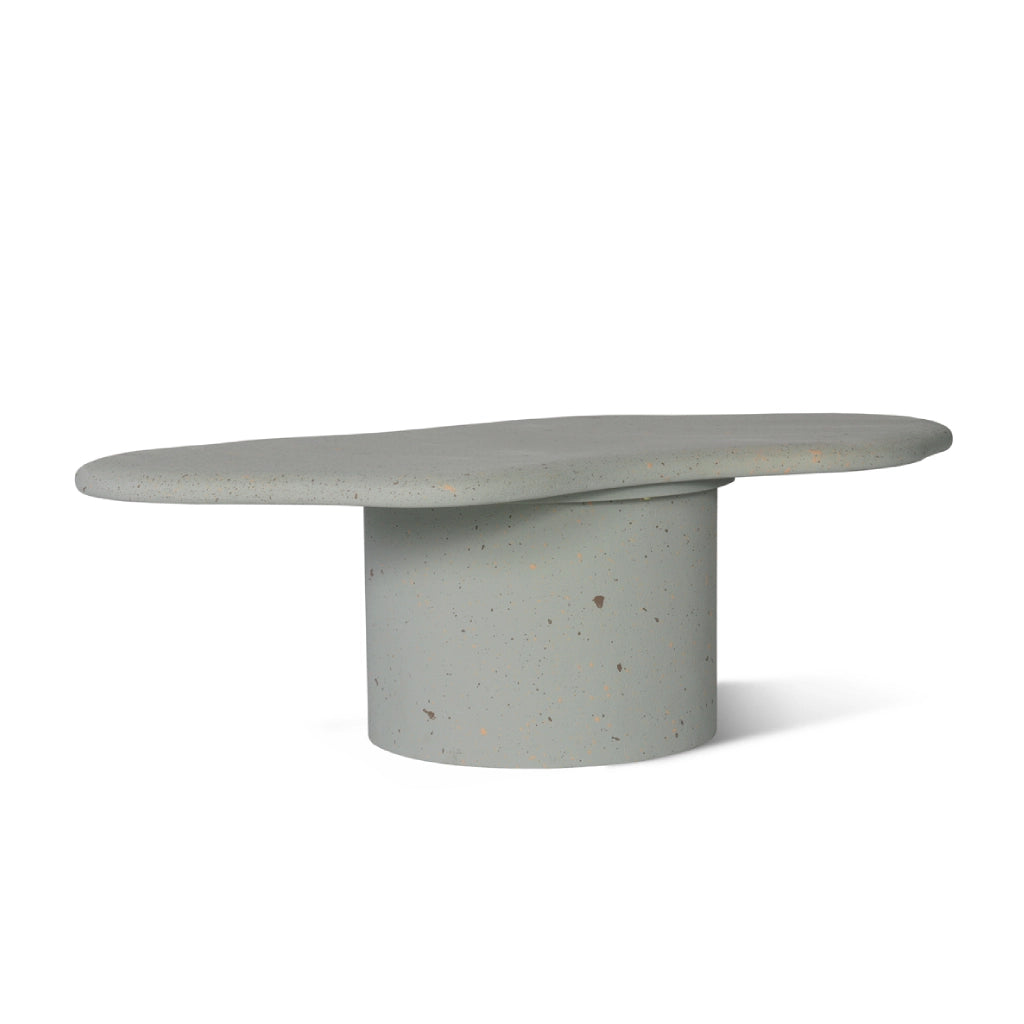 Irregular and circular coffee table design in sky blue micro-cement texture.