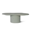 Irregular and circular coffee table design in sky blue micro-cement texture.