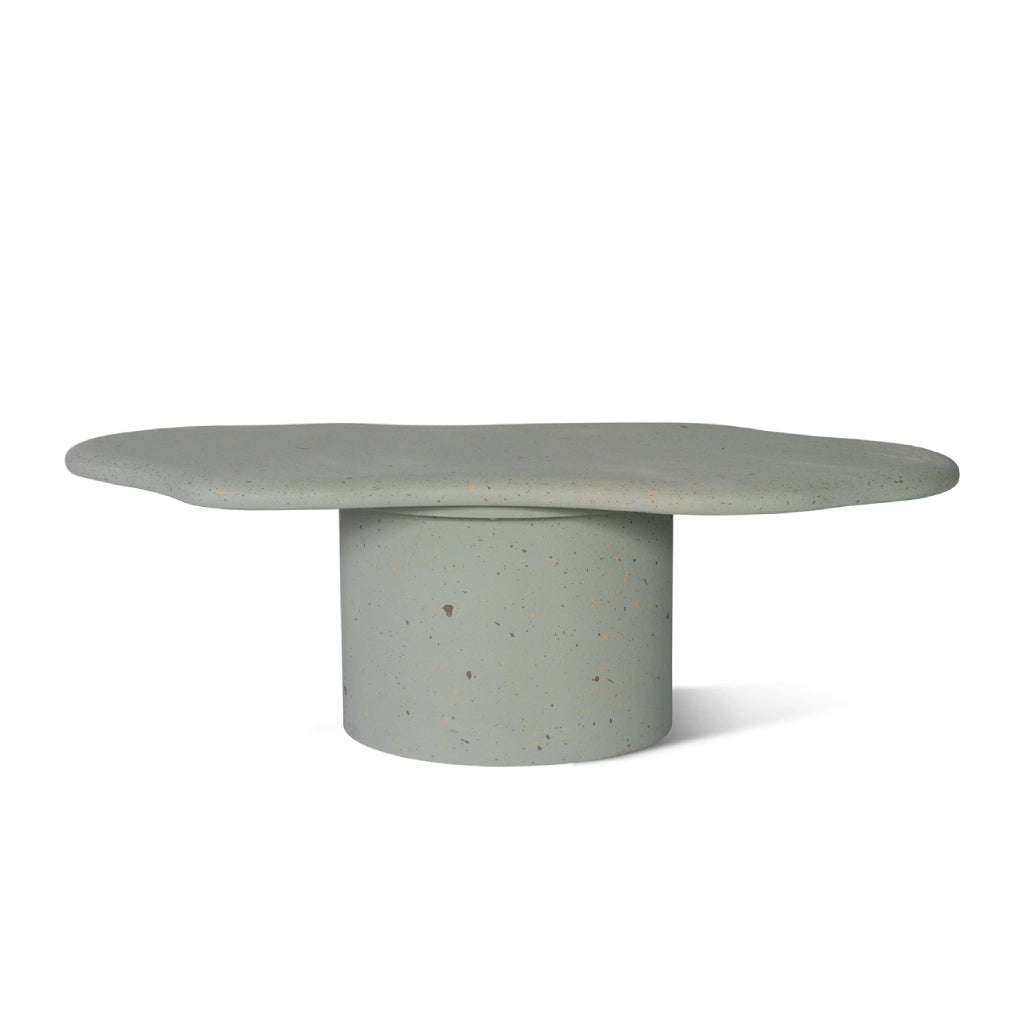 Irregular and circular coffee table design in sky blue micro-cement texture.