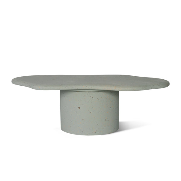 Irregular and circular coffee table design in sky blue micro-cement texture.