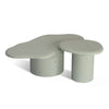 Irregular and circular coffee table design in sky blue micro-cement texture.