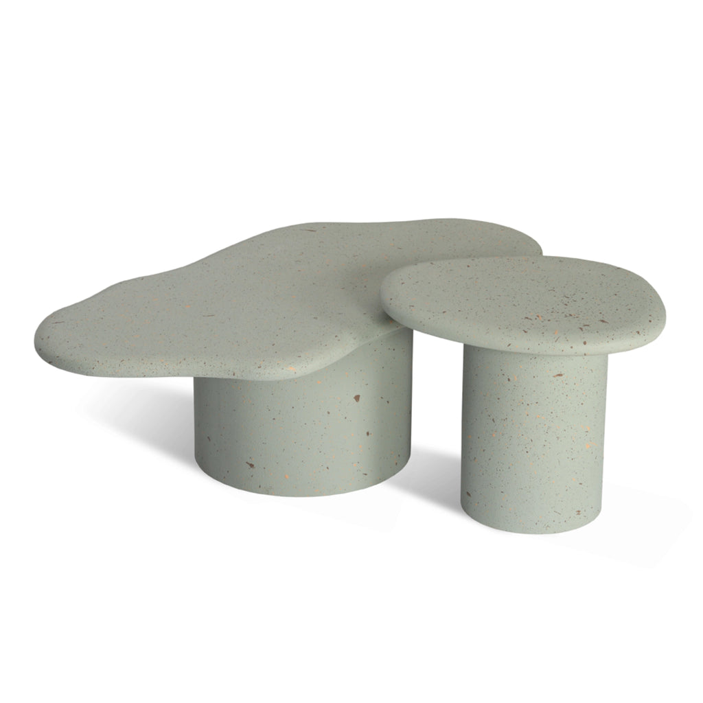Irregular and circular coffee table design in sky blue micro-cement texture.