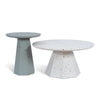 Pair of sculptural round coffee tables with geometric pedestal base