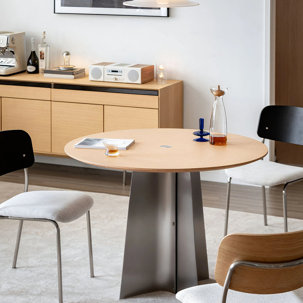 Crux-Round-Dining-Table-Oak-Stainless Steel Base Bevel Table Top Sleek Design Minimal Japandi Dining Set Up