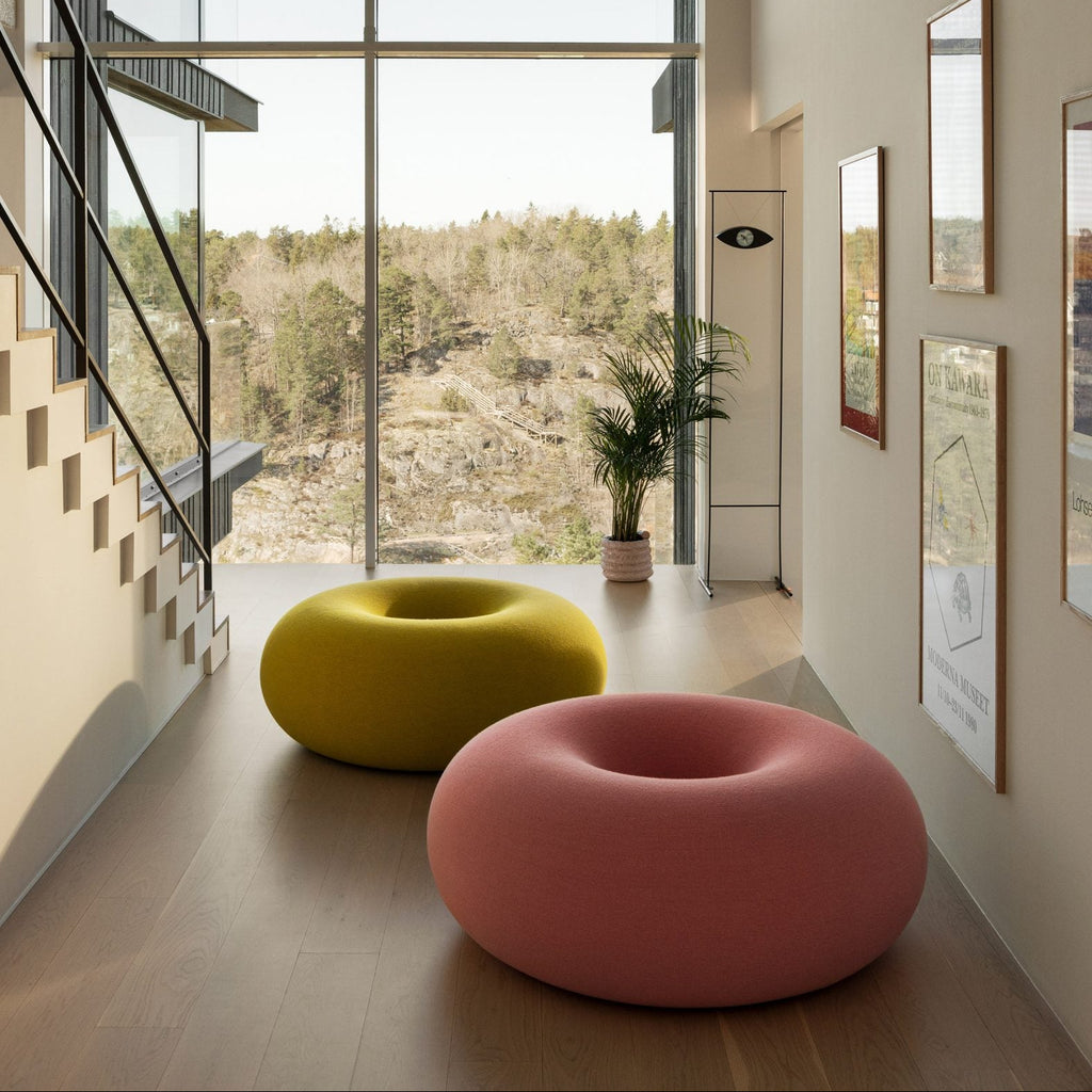 Large lounge chair in the shape of a donut.