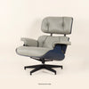 Eames Lounge Chair And Ottoman crafted in beech wood and genuine leather. Black and Grey.
