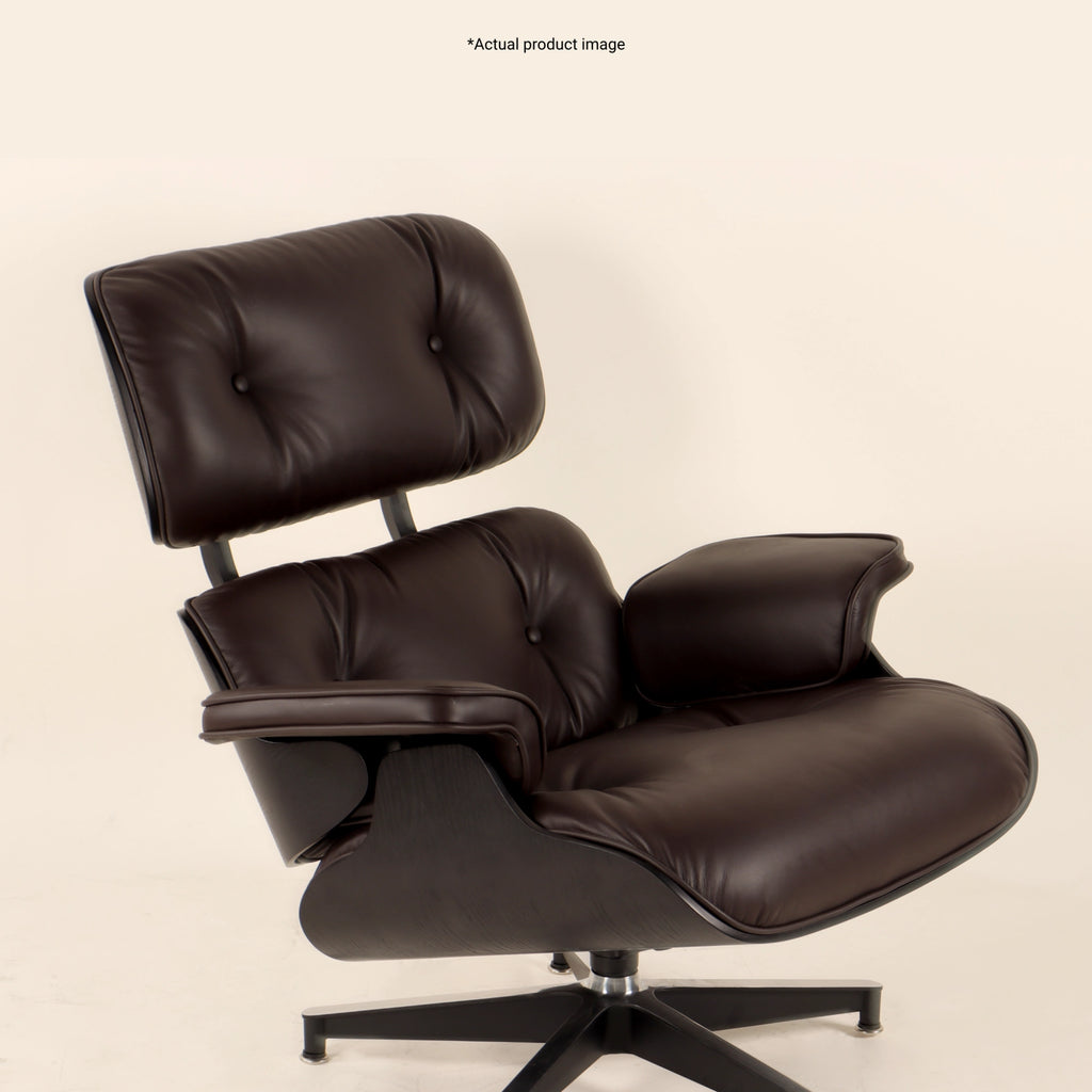 Eames Lounge Chair And Ottoman crafted in beech wood and genuine leather. Black and Dark Brown.