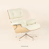 Eames Lounge Chair And Ottoman crafted in beech wood and genuine leather. Oak and White.