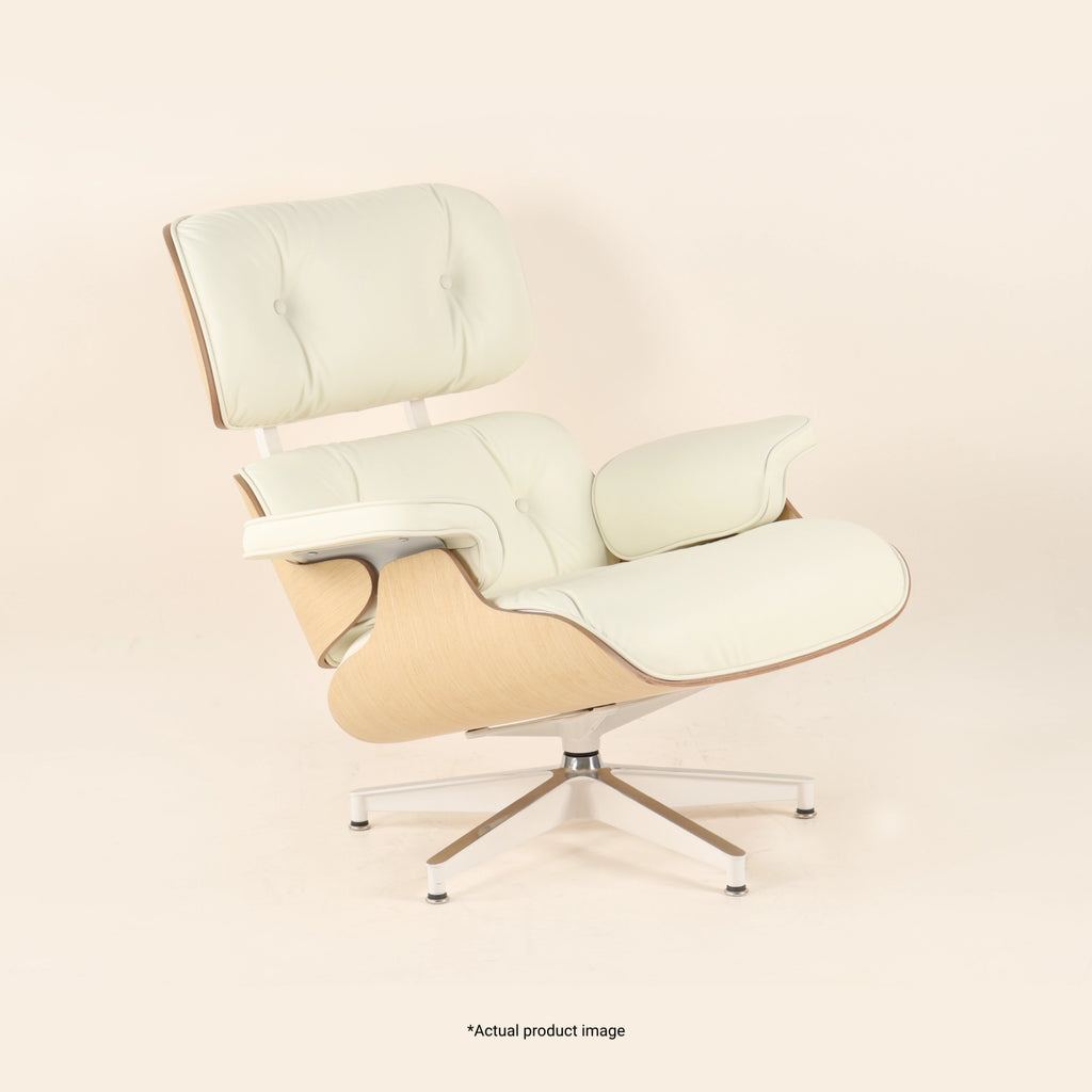 Eames Lounge Chair And Ottoman crafted in beech wood and genuine leather. Oak and White.