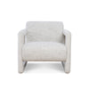 Modern armchair featuring textured white fabric upholstery and geometric armrests.