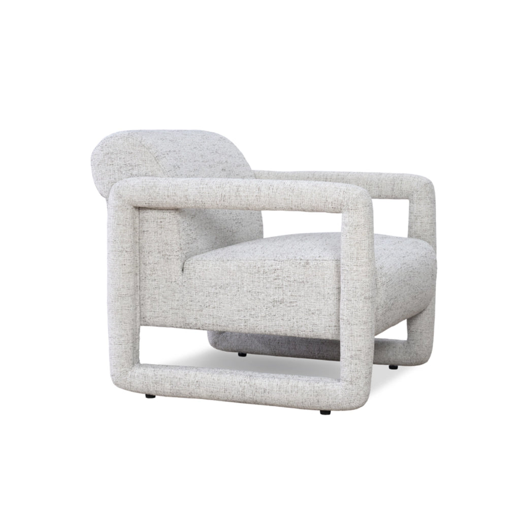 Contemporary armchair with plush white fabric and unique open-frame design.