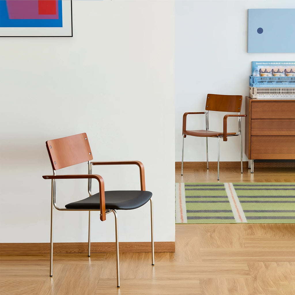 Juno Dining Chair mid century modern design through warm wood tones slender metal lines and an effortlessly graphic silhouette