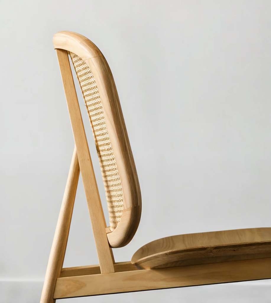 Kane Rattan Armchair wooven Rattan Backrest Minimal Curved Geometric Structure