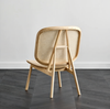 Kane Rattan Armchair wooven Rattan Backrest Minimal Curved Lifestyle