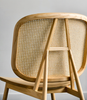 Kane Rattan Armchair wooven Rattan Backrest Minimal Curved Square Backing