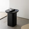 Modern ashwood side table designed with a sleek pedestal base and rounded square top