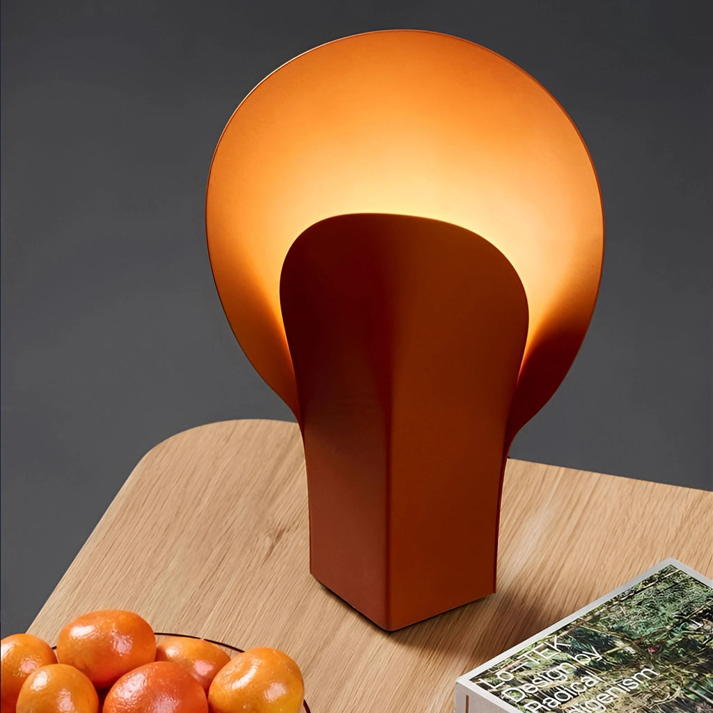 Warm table lamp featuring unique design.