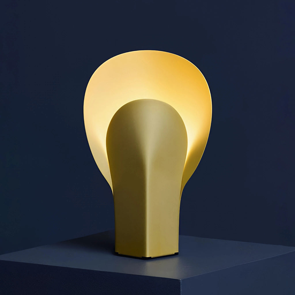 Yellow Gold table lamp featuring a unique design and structure. Bold interior design decor.