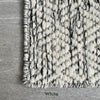 Close up of Hand-woven Nyoko Wool Rug in White