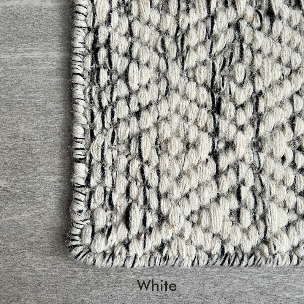 Close up of Hand-woven Nyoko Wool Rug in White