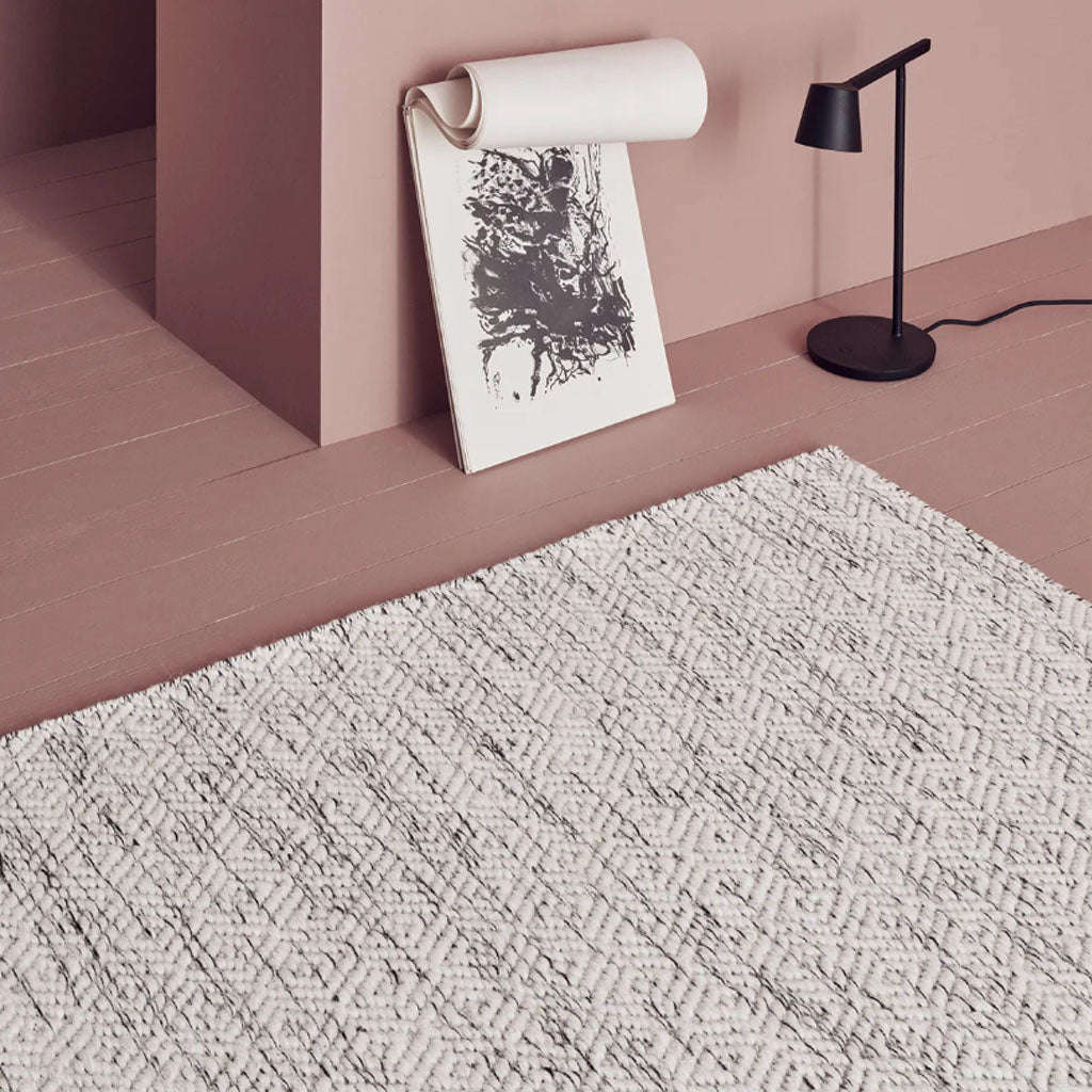 Hand-woven Nyoko Wool Rug in White Texture