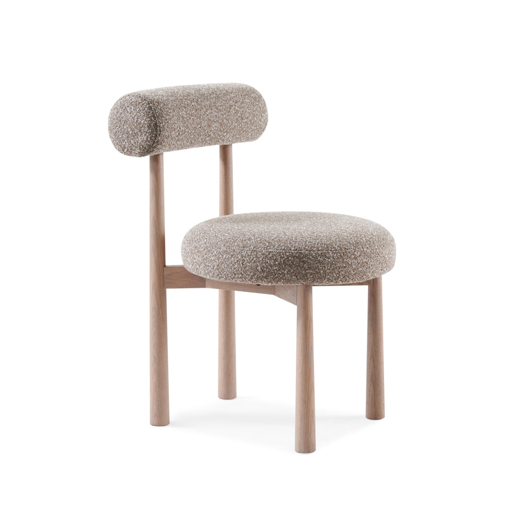 Side Profile of Modern PILLO Dining Chair in Cream Upholstered Seat, Rounded Backrest, and natural wood legs