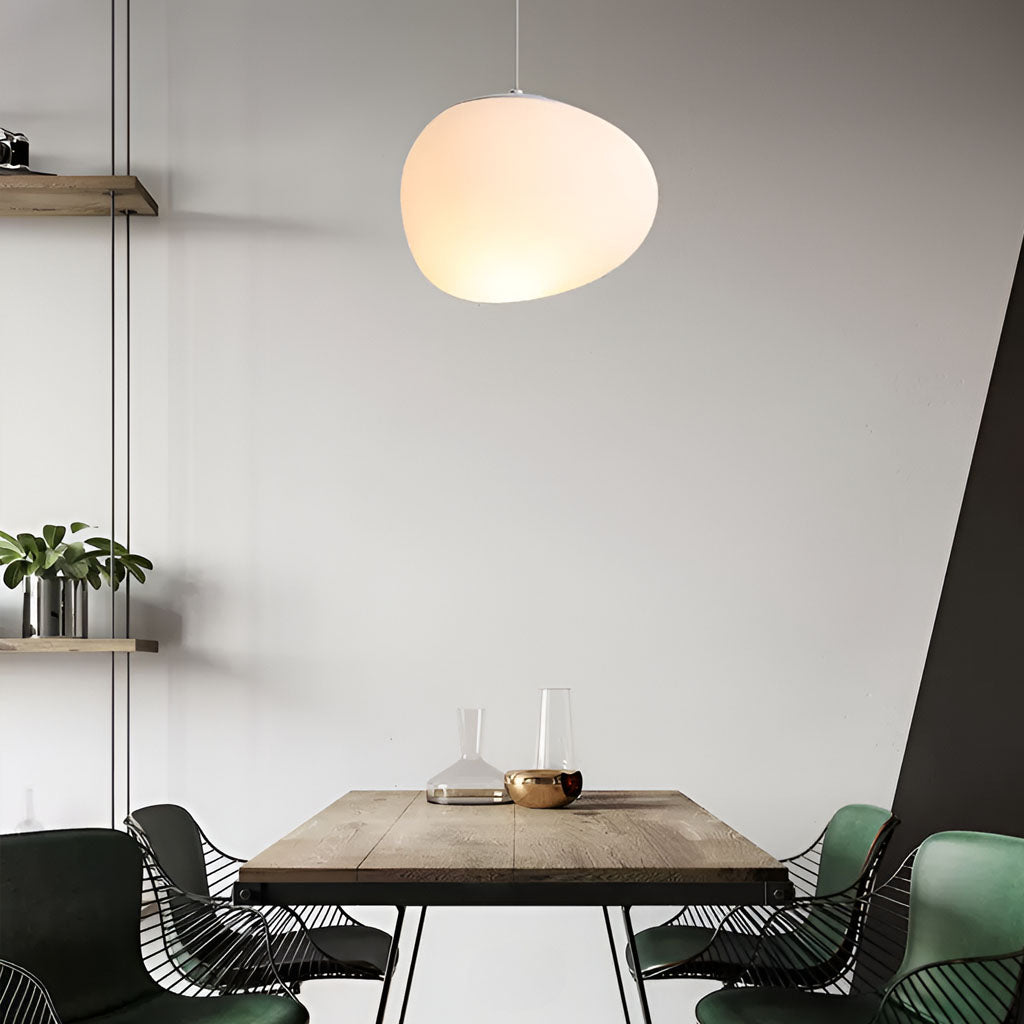 Minimalist, modern and elegant pendant light in white organic pebble shape dining room
