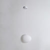 Minimalist, modern and elegant pendant light in white pebble shape