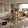 RONAN and ONTTO six-seater round dining set with cane chairs in a modern neutral living and dining room.
