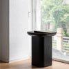 Stylish black ashwood accent table with a square top and cylindrical base for a refined look