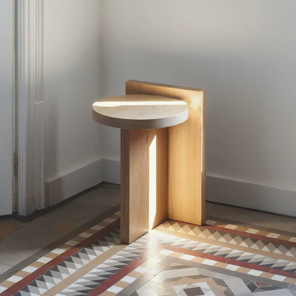 Round top wooden side table for contemporary interiors