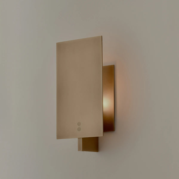 VHP Wall Light Geometric wall lamp in brushed steel offering warm and stylish illumination