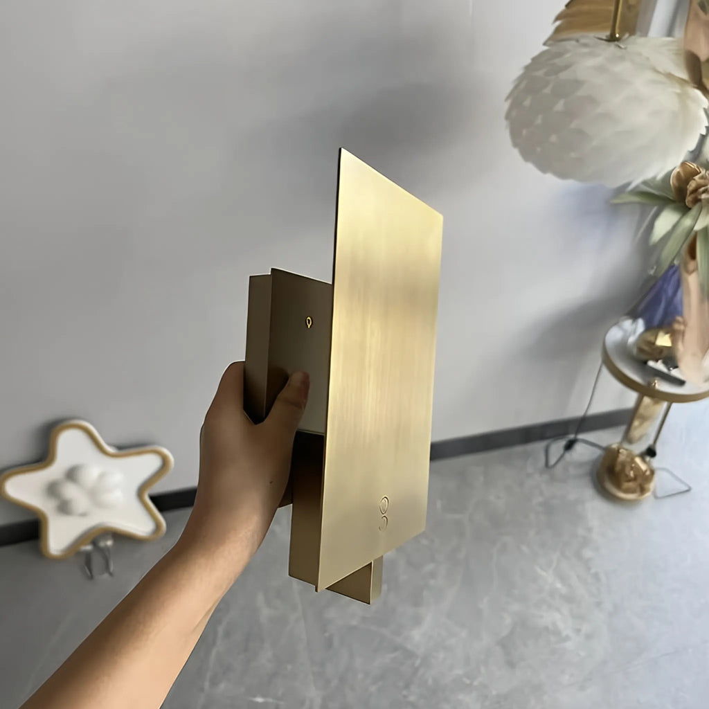 VHP Wall Llight Contemporary steel wall sconce with hidden light source and refined design