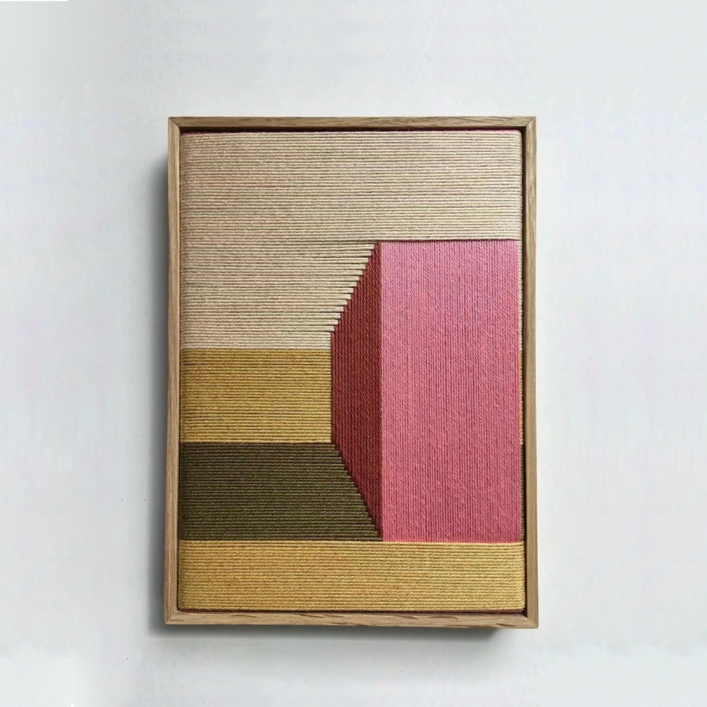 Hand-woven fibre relief wall art with geometric colour-block design in wood frame
