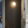 Circ Wall Light Gold Light On Corridor